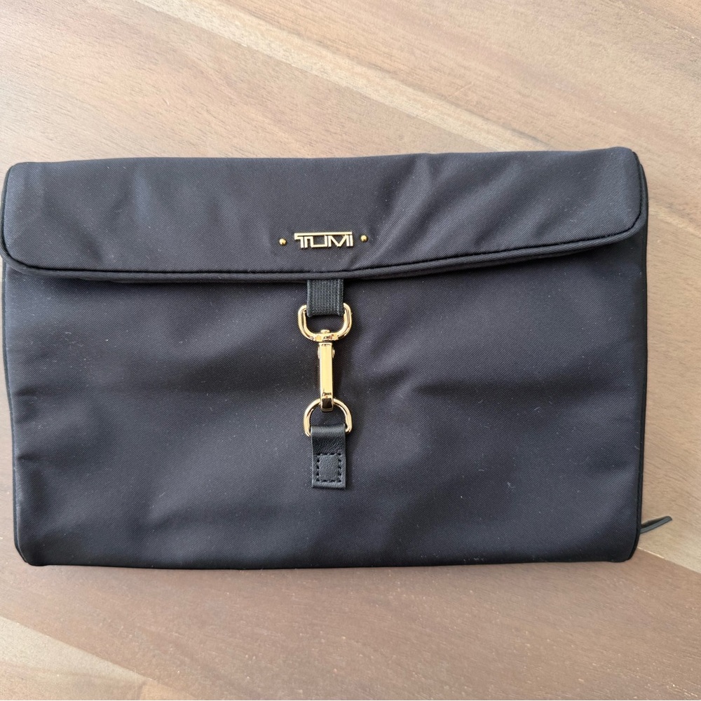 TUMI Black Jewelry Bag with Gold Accents